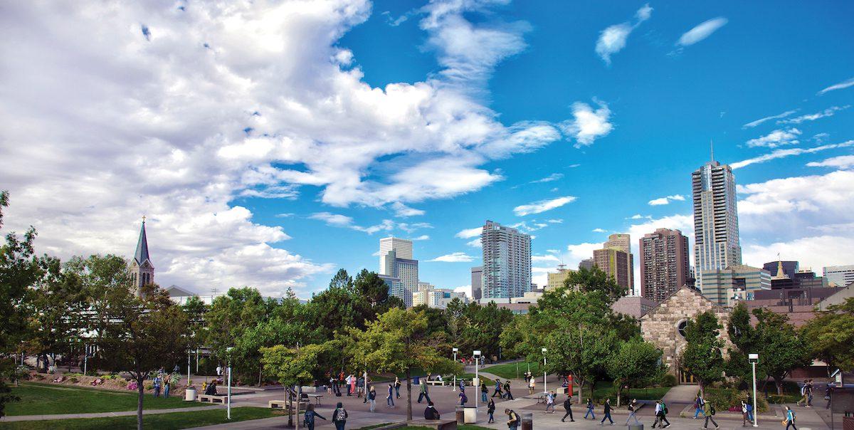 Denver skyline from campus on a sunny, blue sky day.